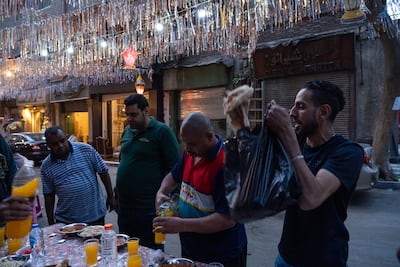 Ramadan's charity meals have resumed in Egypt after two years of Covid restrictions. Mahmoud Nasr / The National