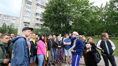 People take part in a guided tour to the places where the HBO series "Chernobyl" was shot in the district Fabijoniskes in Vilnius, Lithuania. All photos by AFP