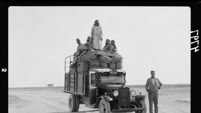 1932: Men on a lorry on the road to Mosul, northern Iraq. AP Photo