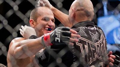 Junior Dos Santos celebrates defeating Frank Mir at UFC 146