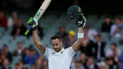 South Africa captain Faf du Plessis celebrates his century during the first day of the third Test cricket match in Adelaide. Jason Reed / Reuters