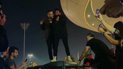 The Weeknd and French Montana were impressed by the Dawn of Justice car. Courtesy Jonny Sierra