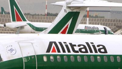 Alitalia airplanes are parked at Fiumicino airport near Rome. Tony Gentile / Reuters