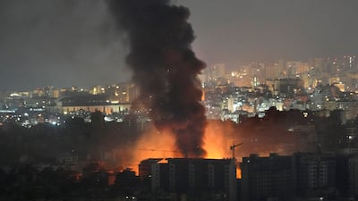 Smoke rises from Israeli strikes on Dahieh, in southern Beirut, on Friday. AP