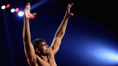 Tayyab Pahelwan of Pakistan celebrates during The Indo-Pak Kushti Wrestling Championship in Dubai. Francois Nel/Getty Images