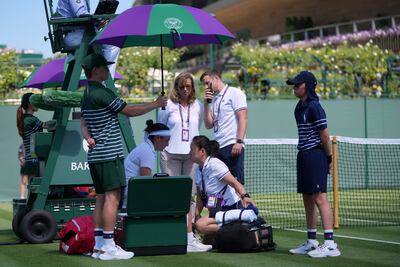 Ons Jabeur receives medical treatment during her Wimbledon first-round match against Varvara Gracheva. AP