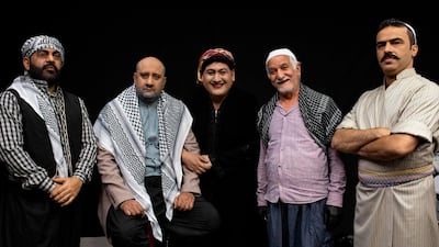 (L to R) Iraqi actors Ayad al-Atabi, Mohammad Qassem, Oussama Mahdi, Kamel al-Azraqi, and Youssef al-Hajjaj pose for a group picture on the set of a parody sketch video of Bab al-Hara, an adaptation of an iconic long-running Syrian television drama, in Iraq's southern port city of Basra on April 22, 2020. AFP / Hussein Faleh