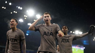 Tottenham's Dejan Kulusevski, centre, celebrates with teammates after making it 3-3 against Manchester City at the Etihad Stadium. AFP