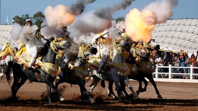 Horse riders perform with guns during the El-Jadida International Horse Show in El-Jadida, south of Casablanca, Morocco. Youssef Boudlal / Reuters