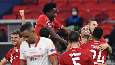 Javi Martinez of Bayern Munich celebrates with teammates after scoring the second goal against Sevilla at the Puskas Arena in Budapest. EPA