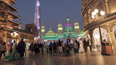 People are seen at the Global village in Dubai Reuters