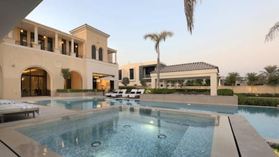 The large pool has an air-conditioned pool house cabana. Courtesy Luxhabitat Sotheby's International Realty