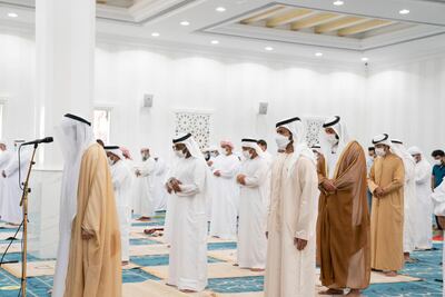Sheikh Khalifa bin Tahnoun offers prayers at the mosque named after an Emirati martyr. Courtesy: Wam