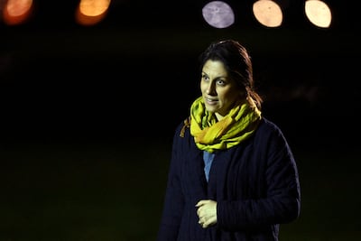 British-Iranian aid worker Nazanin Zaghari-Ratcliffe, who was freed from Iran, gestures after landing at RAF Brize Norton military airbase in Brize Norton, Britain, March 17, 2022. Leon Neal / Pool via REUTERS