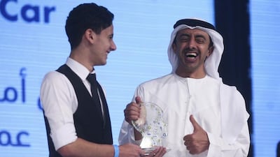 Sheikh Abdullah bin Zayed, Minister of Foreign Affairs, presents a Think Science Competition award to Rami Elmorsi, a Grade 12 pupil at Westminster School. Lee Hoagland / The National