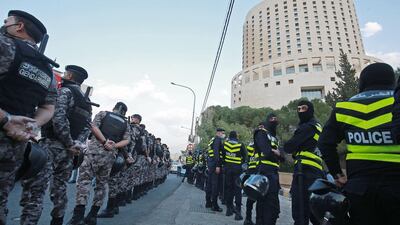 Jordanian security forces are deployed around the French embassy in Amman during a protest by Muslim citizens against French President Emmanuel Macron's defence of cartoons depicting the Prophet Mohammed. Calls to boycott French goods are growing in the Arab world and beyond, after Macron criticised Islamists and vowed not to "give up cartoons" depicting the Prophet Mohammed in recent comments that came in response to the beheading of a teacher, Samuel Paty, outside his school in a suburb outside Paris earlier this month, after he had shown cartoons of the Prophet Mohammed during a class he was leading on free speech. AFP