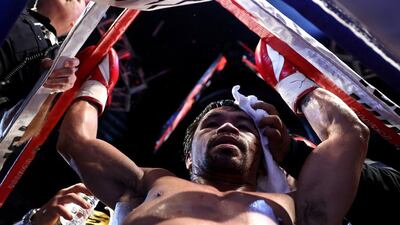 Manny Pacquiao reacts after the conclusion of his WBO welterweight championship fight against Jessie Vargas. Christian Petersen / Getty Images