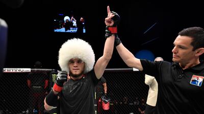 Russia's Umar Nurmagomedov celebrates after his victory over Sergey Morozov of Kazakhstan in a bantamweight fight during the UFC Fight Night event at Etihad Arena in Abu Dhabi. Getty