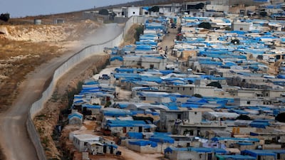 The border wall between Turkey and Atimah town in Idlib, Syria. Osman Orsal