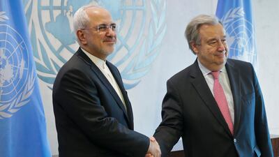 UN secretary general Antonio Guterres (R) and Iran's foreign minister Javad Zarif exchange hand shakes before their meeting on Monday at the UN headquarters. AP / Bebeto Matthews