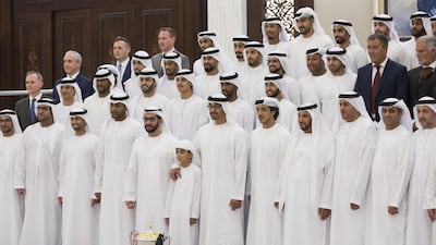 Sheikh Hamdan bin Zayed, the Ruler’s Representative in the Western Region, eighth right, Sheikh Rashid bin Hamdan bin Zayed, seventh right, Sheikh Mohammed bin Zayed, Sheikh Mansour bin Zayed, Deputy Prime Minister and Minister of Presidential Affairs, fifth right, and Sheikh Mohamed bin Butti Al Hamed, fourth right, with Al Jazira Football Club members. Ryan Carter / Crown Prince Court - Abu Dhabi