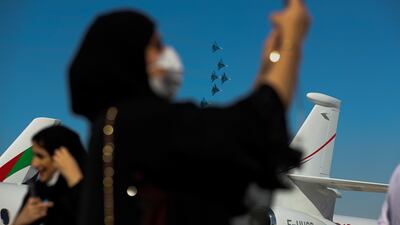 Guests wear face masks at the Dubai Airshow in Jebel Ali last November. EPA