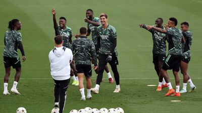 Real Madrid's players, including goalkeeper Thibaut Courtois, centre, during training. AFP