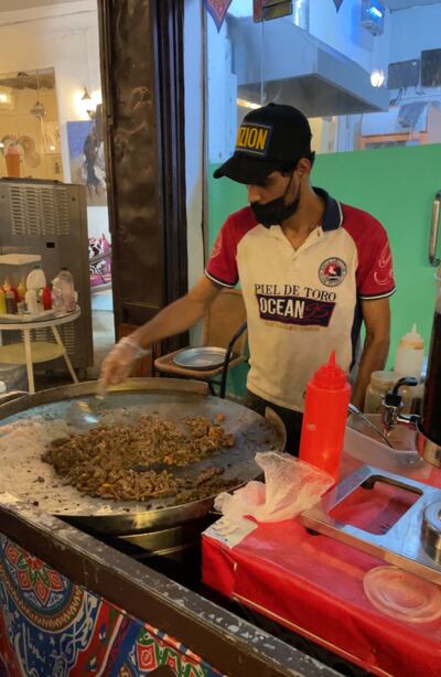 A man making kibbeh in Al Balad, Jeddah. Mariam Nihal / The National