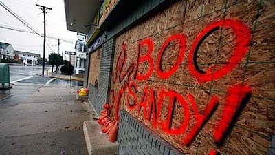 Shops are boarded up in New Jersey with a message for the imminent Hurricane Sandy.