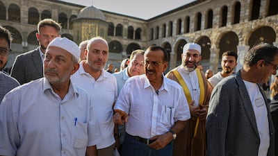 Emirati business magnate Khalaf Al Habtoor visits the Umayyad Mosque in Damascus. AP
