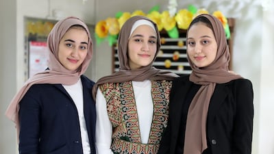 Lujain Thouqan, Farah Thouqan and Leen Thouqan, triplet sisters who scored the same top mark in high-school final exams at the Al-Hikmah Private School in Ajman.