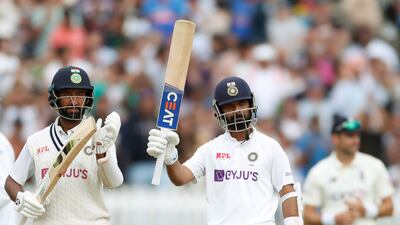 India's Ajinkya Rahane celebrates his half century.