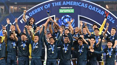 Players of Pachuca pose with a trophy after winning the so-called 'Derby of the Americas' after the Fifa Intercontinental Cup 2024 quarter-final match with Botafogo. EPA