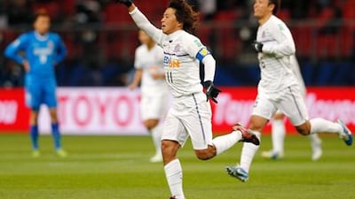 Sanfrecce Hiroshima's Hisato Sato celebrates his goal against Ulsah Hyundai.