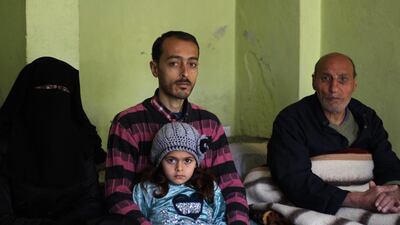 Fatima Ibrahim, left, is the sole breadwinner for a family of seven Syrian refugees in Kilis, Turkey. She and her brother Mohammed, centre, say they are determined to try smuggle themselves to Europe despite a new deal between the European Union and Turkey that promises to crack down on illegal migration. Josh Wood for The National