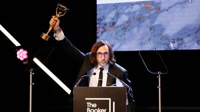 Paul Lynch, author of 'Prophet Song', accepts the 2023 Booker Prize. EPA