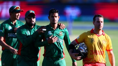 Ryan Burl walks off the field during the T20 World Cup match between Bangladesh and Zimbabwe at The Gabba on October 30, 2022 in Brisbane. AFP