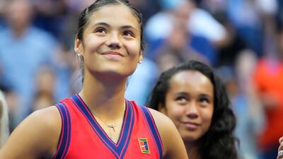 Emma Raducanu of Great Britain, left, and Leylah Fernandez of Canada during the trophy presentation after their match in the women's singles at the US Open, September 12. USA TODAY Sports