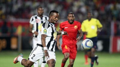 TP Mazembe player Mpela Kimwaki looks to play the ball during the first leg of the African Champions League semi-final against Al Merrikh last weekend in Khartoum, Sudan. Ebrahim Hamid / AFP / September 26, 2015