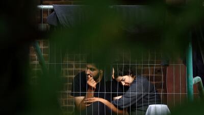 People inside the immigration processing centre at Manston in south-east England. Reuters