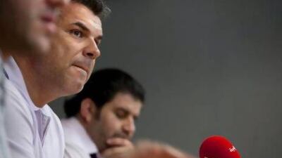 Cosmin Olaroiu addresses a news conference in Al Ain on Wednesday. Silvia Razgova / The National