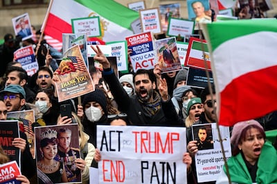 Anti-Iranian regime protesters chant slogans during a rally outside the US Consulate in Milan on January 13, 2026. AFP
