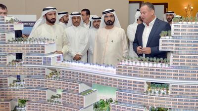 Sheikh Mohmmed bin Rashid inspects a model of the Royal Atlantis Hotel which will be built on the Palm Jumeirah. Wam