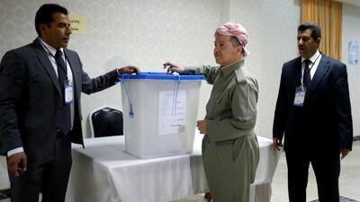 Iraqi Kurdish President Masoud Barzani casts his vote. Azad Lashkari / Reuters