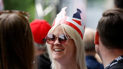 Royal fans gather on The Mall outside Buckingham Palace. AP Photo