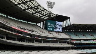 A tribute to cricket legend Shane Warne is displayed on the big screens at the Melbourne Cricket Ground. AP