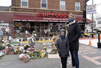 Tiffany Blomgren brought her seven-year-old son Greer to George Floyd Square the morning after former police officer Derek Chauvin was found guilty of all three charges against him. Willy Lowry / The National