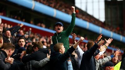 Chelsea fans celebrate during the Premier League match against Aston Villa at Villa Park on February 7, 2015, in Birmingham, England. Clive Mason / Getty Images