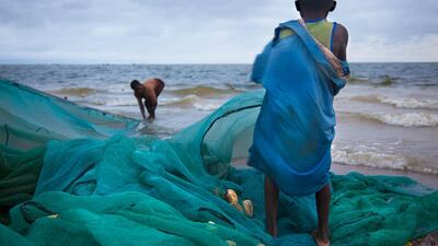 'Fishing Nets' by Lisa Kristine. The children are tasked with untangling nets that get caught underwater. Most of the children are not taught how to swim, and a number die from drowning every year.