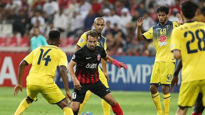 Everton Ribeiro, in red, had been expected to make the move away from Al Ahli for the past few weeks. Pawan Singh / The National